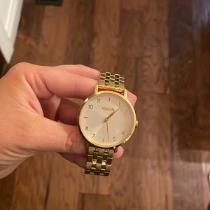 Womens gold Nixon watch